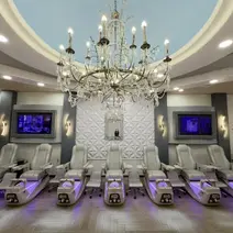 Salon interior chandelier and pedicure area Houston